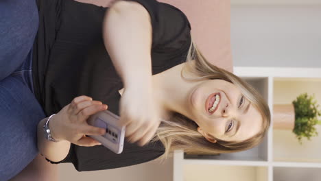 Vertical-video-of-Successful-woman-is-happy.